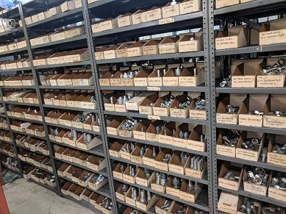 Shelves of hydraulic fittings and adapters in the City Diesel hose shop